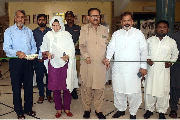 ADCG Dr.Abida Fareed cutting the ribbon to the inauguration Photographic Exhibition of Quaid e Azam in connection to the upcoming independence day at the Arts Council