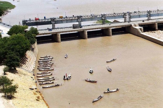 A view of large numbers boat are parked on the bank of River Indus.