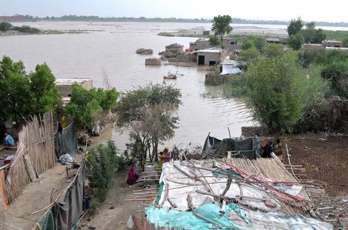 A view of flood water entered in kacha area at Sehrish Nagar near Indus River