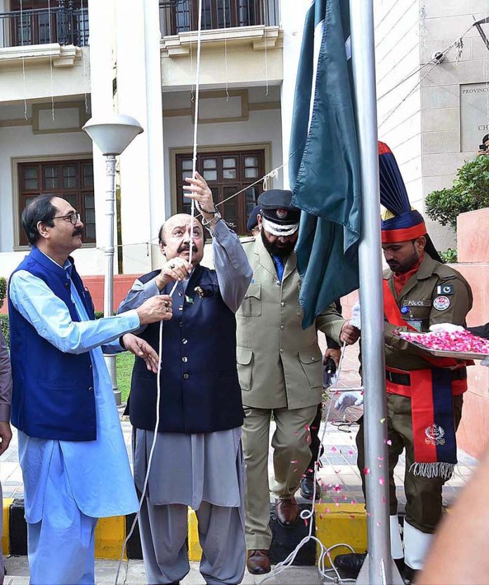 Speaker Punjab Assembly Muhammad Sabatin Khan hoisting Flag of Pakistan on the occasion of 77th Independence Day celebration