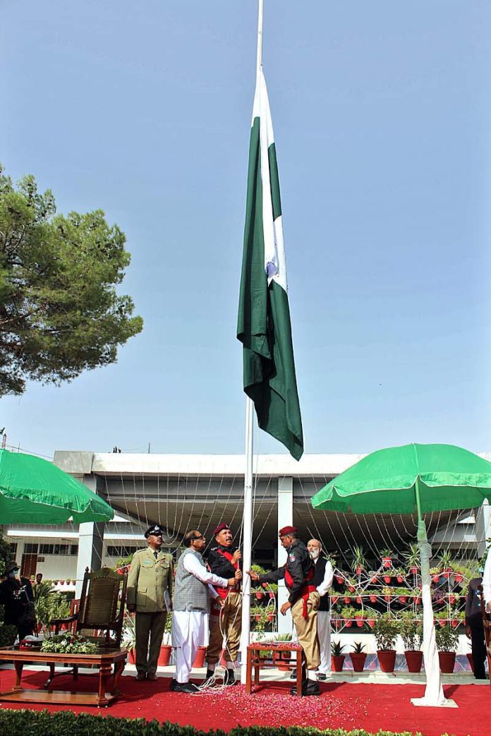 Speaker Balochistan Assembly Mir Jan Muhammad Jamali hoisting Flag of Pakistan on the occasion of 77th Independence Day celebration at Balochistan Assembly