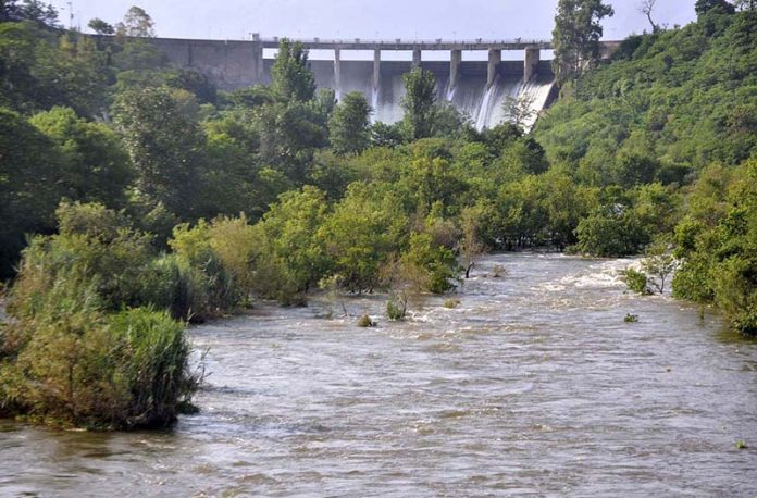 Rawal Dam authorities open spillway of the reservoir after dam water level rose to alarming level due to heavy rain