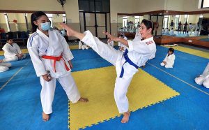 Karate players are in action during training class of judo karate at Qayyum Sports Complex