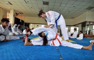 Karate players are in action during training class of judo karate at Qayyum Sports Complex