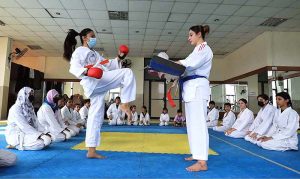 Karate players are in action during training class of judo karate at Qayyum Sports Complex