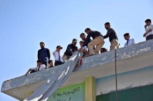 The Civil Defence Volunteers are conducting a drill during the National Resilience Day organized by Chief Warden & Members of Civil Defence Organization at FG Boys School F8/3.