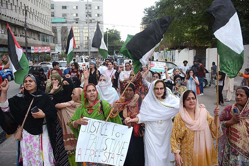 Activists of civil society organize a protest demonstration to show solidarity with the people of Palestine, call for an immediate ceasefire at Karachi Press Club