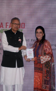 President Dr. Arif Alvi giving away a shield to lady doctor during a programme titled 'Spirit of Female Enterpreneurship and Medical Leadership' organized by Sehat Kahani at a local hotel.