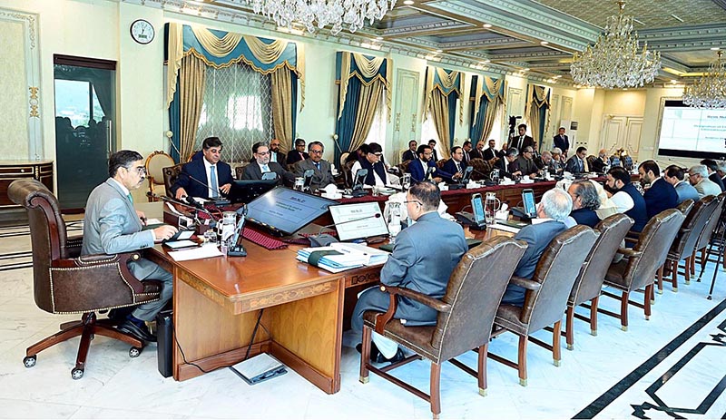 The Caretaker Prime Minister Anwaar-ul-Haq Kakar chairs a meeting of ...