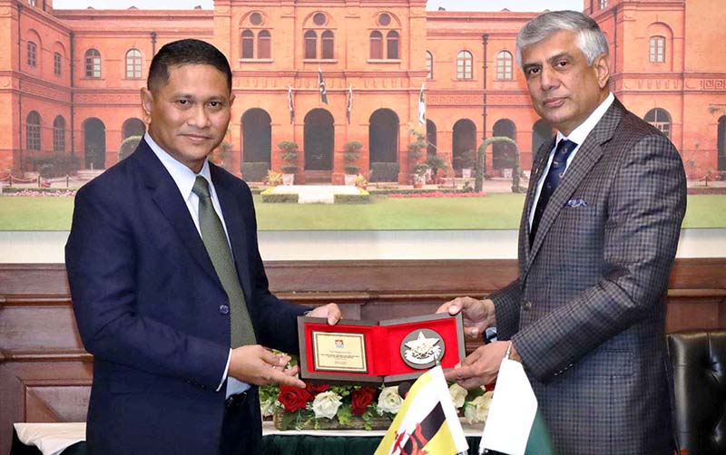 Secretary Defence, Lt Gen (Retd) Hamood uz Zaman Khan and Brunei Permanent Secretary Defence, Brig Gen (Retd) Dato Seri Pahlawan Haji Alirupendi Bin Haji Perudin signing MoM, in Ministry of Defence