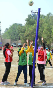 A view of netball match played between County Cambridge High School and Government Girls High School Latifabad teams during PNF Netball Cup 2023 at Shah Latif Girls College