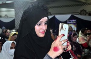 Beautician showing her skills during Cosmetics launching ceremony event in a local hotel.