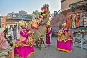 Artists performing traditional dance during “Folk Festival Lok Mela” at Lok Virsa. 