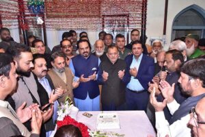 Chamber of Commerce Executive Body Members Chairman Committee Syed Shahbaz Ibn Iqbal, Shehbaz Saim, former District Nazim Mian Naeem Javed praying during cake cutting ceremony to mark the 146th birth anniversary of National Poet, Dr. Allama Muhammad Iqbal at Mazar-e-Iqbal