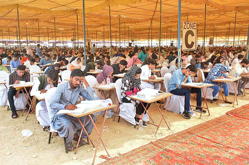 Students are solving their question papers during Pre entry test for admission in the Liaquat University of Medical & Health Sciences (LUMHS)