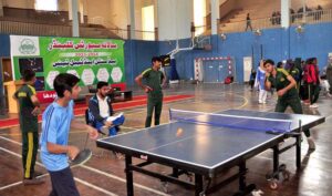 A group photo of Commissioner Sargodha Muhammad Ajmal Bhatti, Divisional Sports Officer Nesar-ul-Haq with players during the under 16 Inter District Badminton and Table Tennis Girls and Boys competition organized by Sports Department at Gymnasium