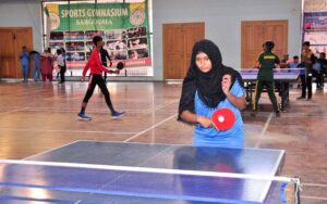 A group photo of Commissioner Sargodha Muhammad Ajmal Bhatti, Divisional Sports Officer Nesar-ul-Haq with players during the under 16 Inter District Badminton and Table Tennis Girls and Boys competition organized by Sports Department at Gymnasium