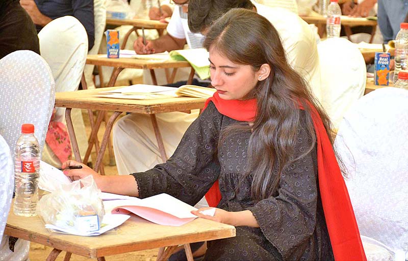 Students are solving their question papers during Pre entry test for admission in the Liaquat University of Medical & Health Sciences (LUMHS)