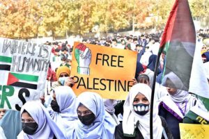 Students of different Schools and Colleges hold placards during a pro-Palestinian rally organized by the Private Education Network Gilgit-Baltistan