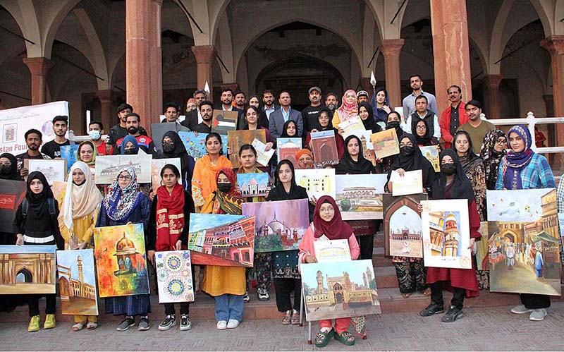 Artist giving final touch to painting in Dewane Aam Painting Competition inside Shahi Fort in collaboration with Bab Pakistan Foundation and Walled City Authority Lahore