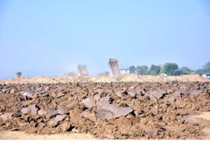 Heavy machinery being used to build Chak Beli Link Road in the outskirts of the city