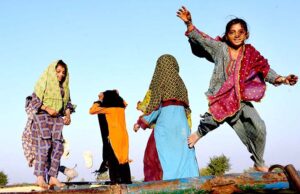 Children enjoy on swing at Ghazi Khan Khuhawar Village.