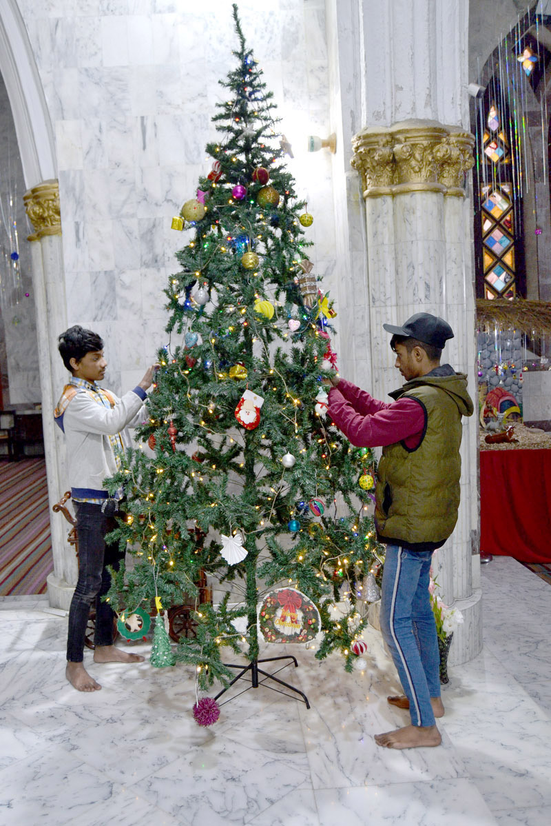 Members of the Christian community are adorning Anthony Church in preparation for the upcoming Christmas celebration