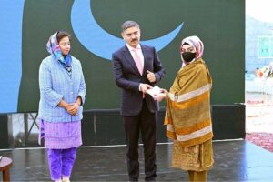 Caretaker Prime Minister Anwaar-ul-Haq Kakar distributes cheques among the high achievers of NUST hailing from Balochistan