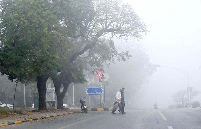 A view of dense fog covering surrounding areas of Lehtrar Road during ...