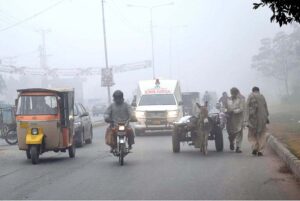 A view of dense fog covering surrounding areas of Road during morning time