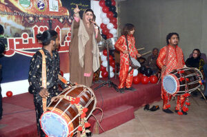 Somiana Khan performing on stage during Sham Qalandar organized by Oriental Welfare Society at Gaddafi Hall.