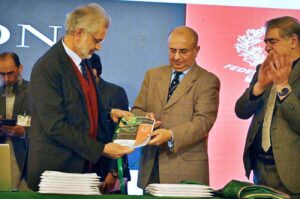 Mr.Justice Syed Mansoor Ali Shah presenting a copy of FJA Vision to Hon'ble Chief Justice of Pakistan, Mr Justice Qazi Faez Isa in the Conference on the Launch of Vision and E-Campus at the Federal Judicial Academy