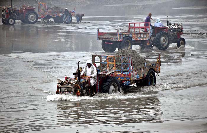 Tractor trolley loaded with river sand one of the fine sand used in ...