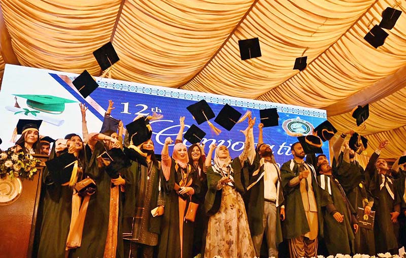 Caretaker minister for Tourism and Environment Arshad Wali Muhammad confers Gold Medal to a graduate during the 12th Convocation of Sindh Agriculture University Tandojam