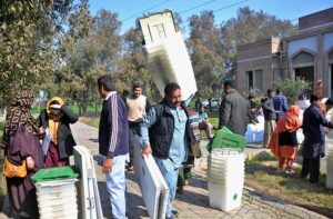  Polling staff receiving polling material at distribution Centre for General Elections 2024.