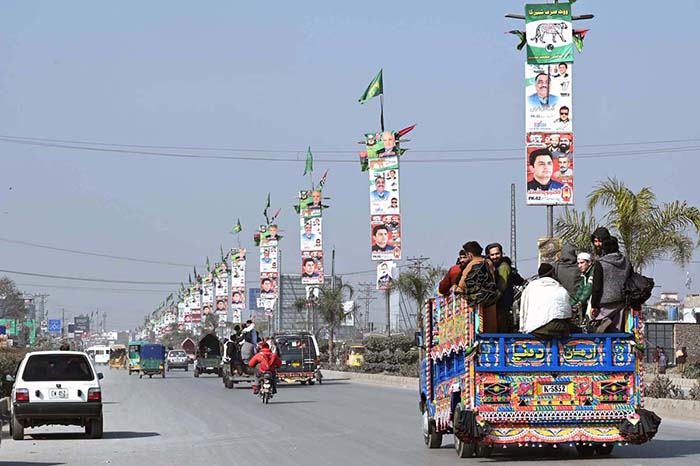 View Of Different Political Parties Posters And Banners Displayed On   APP18 060224Peshawar 