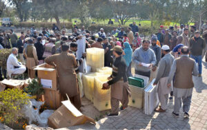 Polling staff receiving polling material at distribution Centre for General Elections 2024.