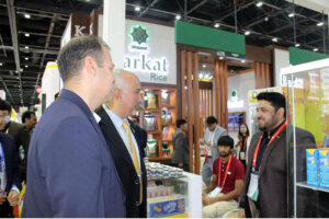 Ambassador, Faisal Niaz Tirmizi, Pakistan's Envoy to the UAE sharing a light moment with Pakistani exporter during the Gulf Food Exhibition at the Pakistan Pavilion, World Trade Centre