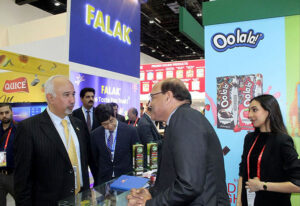 Ambassador, Faisal Niaz Tirmizi, Pakistan's Envoy to the UAE sharing a light moment with Pakistani exporter during the Gulf Food Exhibition at the Pakistan Pavilion, World Trade Centre