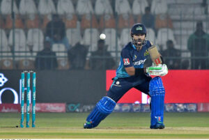 Multan Sultans batter Muhammad Rizwan plays a shot during the Pakistan Super League (PSL) Twenty20 cricket match between Multan Sultans and Karachi Kings at the Multan Cricket Stadium