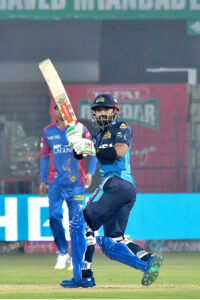 Multan Sultans batter Muhammad Rizwan plays a shot during the Pakistan Super League (PSL) Twenty20 cricket match between Multan Sultans and Karachi Kings at the Multan Cricket Stadium