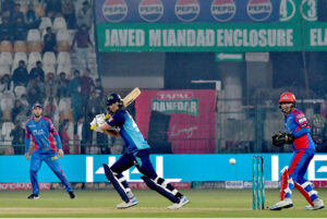 Multan Sultans batter Muhammad Rizwan plays a shot during the Pakistan Super League (PSL) Twenty20 cricket match between Multan Sultans and Karachi Kings at the Multan Cricket Stadium