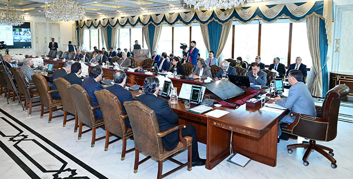 Caretaker Prime Minister Anwaar-ul-Haq Kakar chairs a meeting of the ...