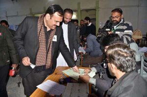 Candidate NA -57, Rashid Shafiq casts his vote in a polling station during General Elections-2024.