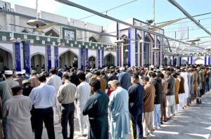 People perform the first Friday prayer at a mosque during the holy month of Ramadan at Saddar.