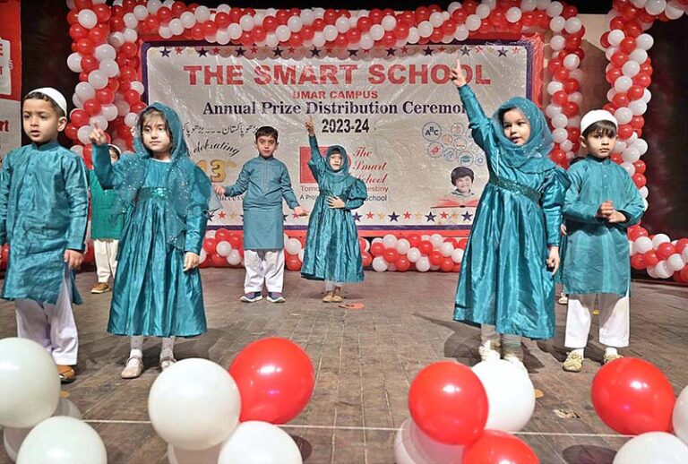 Students performing in tableau during annual prize distribution