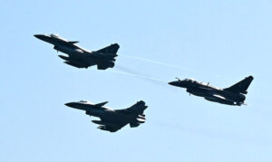 Pakistan Air Force fighter aircrafts demonstrate aerobic feats participating in Pakistan Day 2024 parade ceremony, at Shakarparian Parade Ground