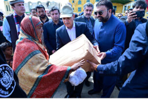 Prime Minister Muhammad Shehbaz Sharif distributes relief items among the affectees of torrential rains