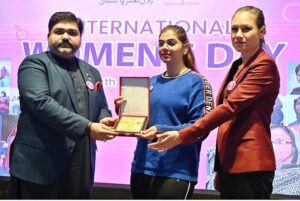 Chairman Pakistan Red Crescent Society, Sardar Shahid Ahmed Laghari and Ambassador of the Turkish Republic of Northern Cyprus in Pakistan Ms. Dilsad Senol along with the volunteers cutting cake at a seminar on International Women's Day Celebration under theme "Invest in Women Accelerate Progress"