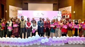 Chairman Pakistan Red Crescent Society, Sardar Shahid Ahmed Laghari and Ambassador of the Turkish Republic of Northern Cyprus in Pakistan Ms. Dilsad Senol along with the volunteers cutting cake at a seminar on International Women's Day Celebration under theme "Invest in Women Accelerate Progress"